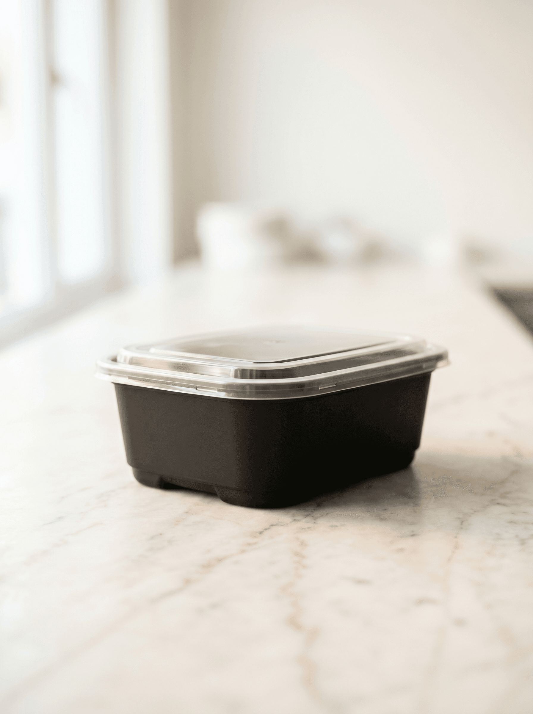 Black rectangular plastic takeaway container